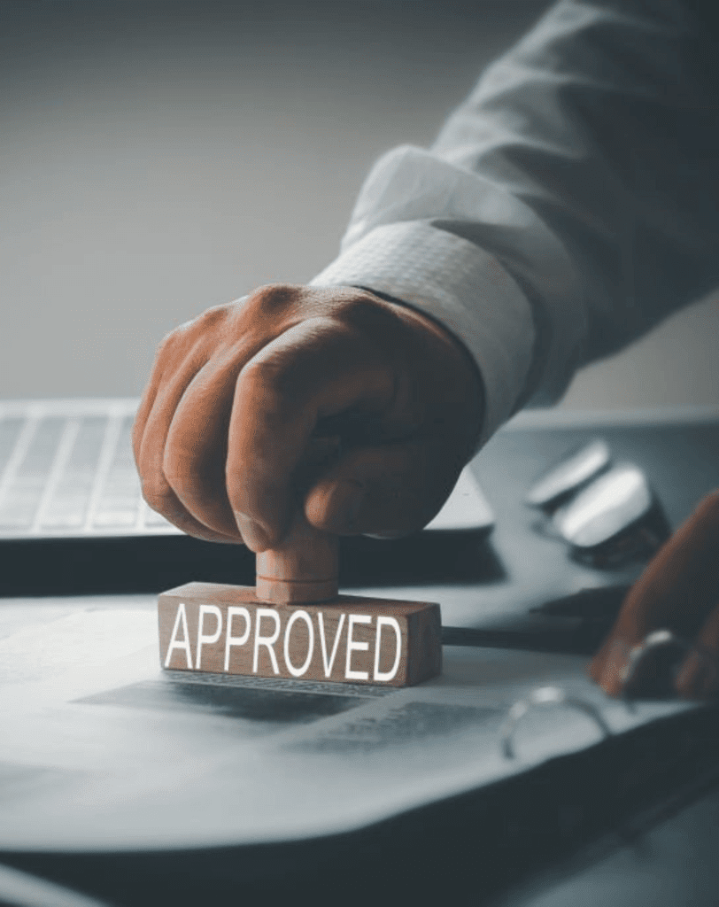 mobile notary public: Man using the notary stamp to approve document
