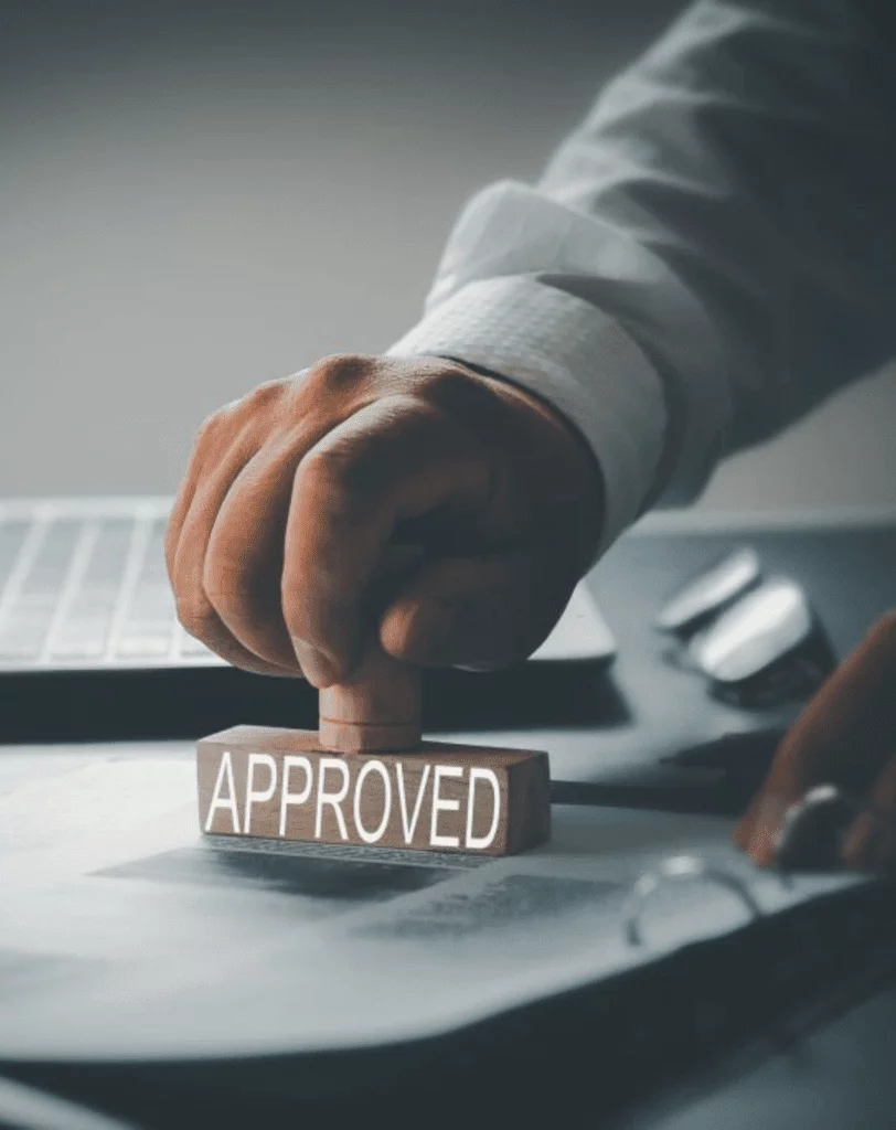 mobile notary public: Man using the notary stamp to approve document